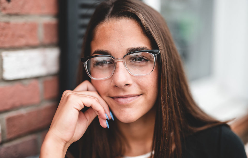 Woman enjoying her Bluwinx Glasses - Carmen